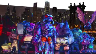 The villains of the new Mutant Mayhem movie pose in front of the New York City skyline at night. Gengis Frog, Bebop, Superfly, Rocksteady, Ray Fillet, Mondo Gecko, and Leatherhead. 